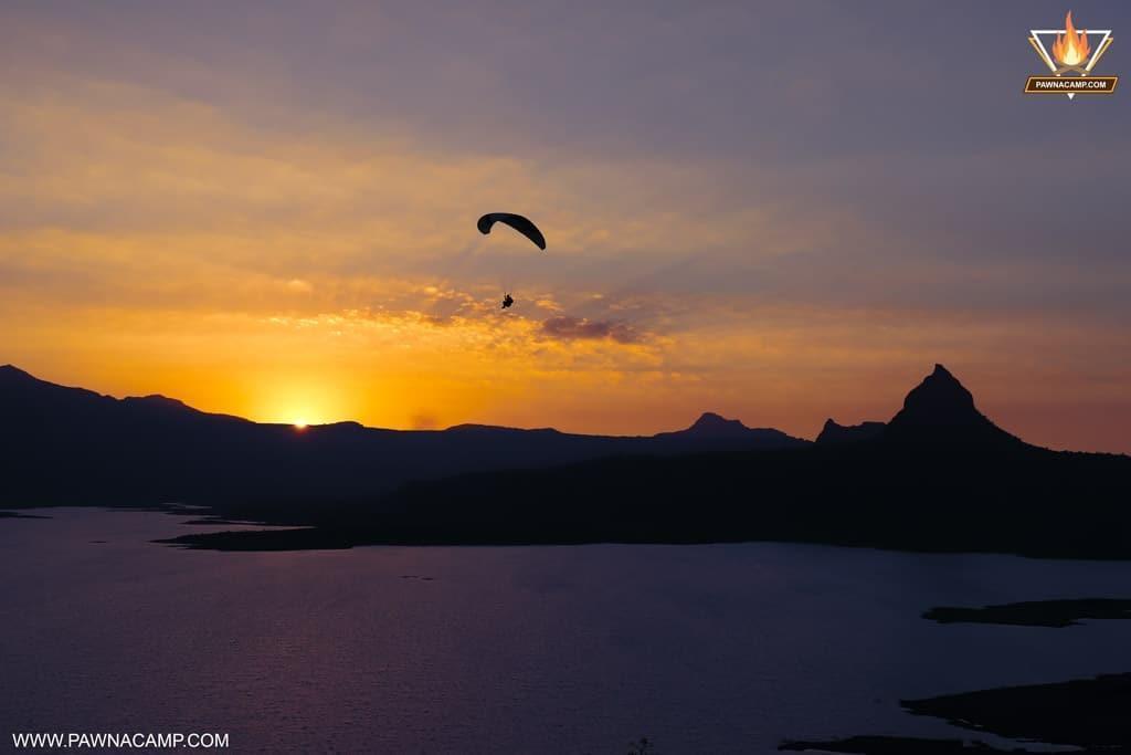 Pawna lake paragliding while sunset