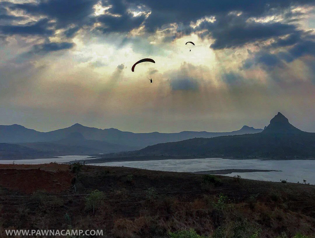 paragliding at pawna lake - paragliding in the air